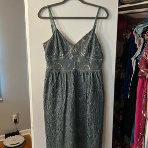 Blue lace overlay spaghetti strap cocktail dress.